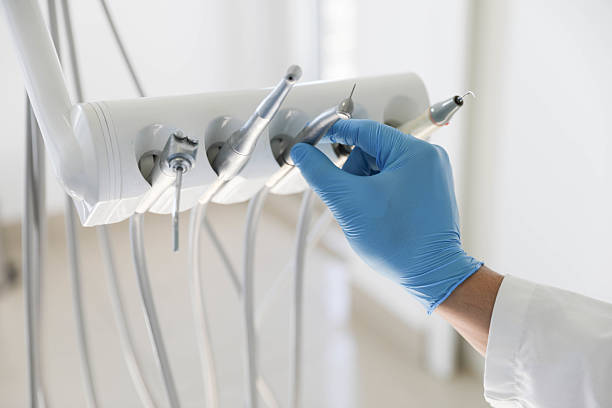 Professional Tooth Extraction technician working in St. Martins, MO